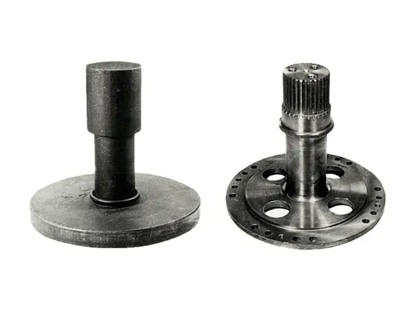Two flanged parts on a white background: a shaft welded to a disc, and a drilled flange with a splined shaft stub